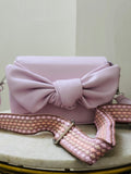 Bow sling/shoulder bag
